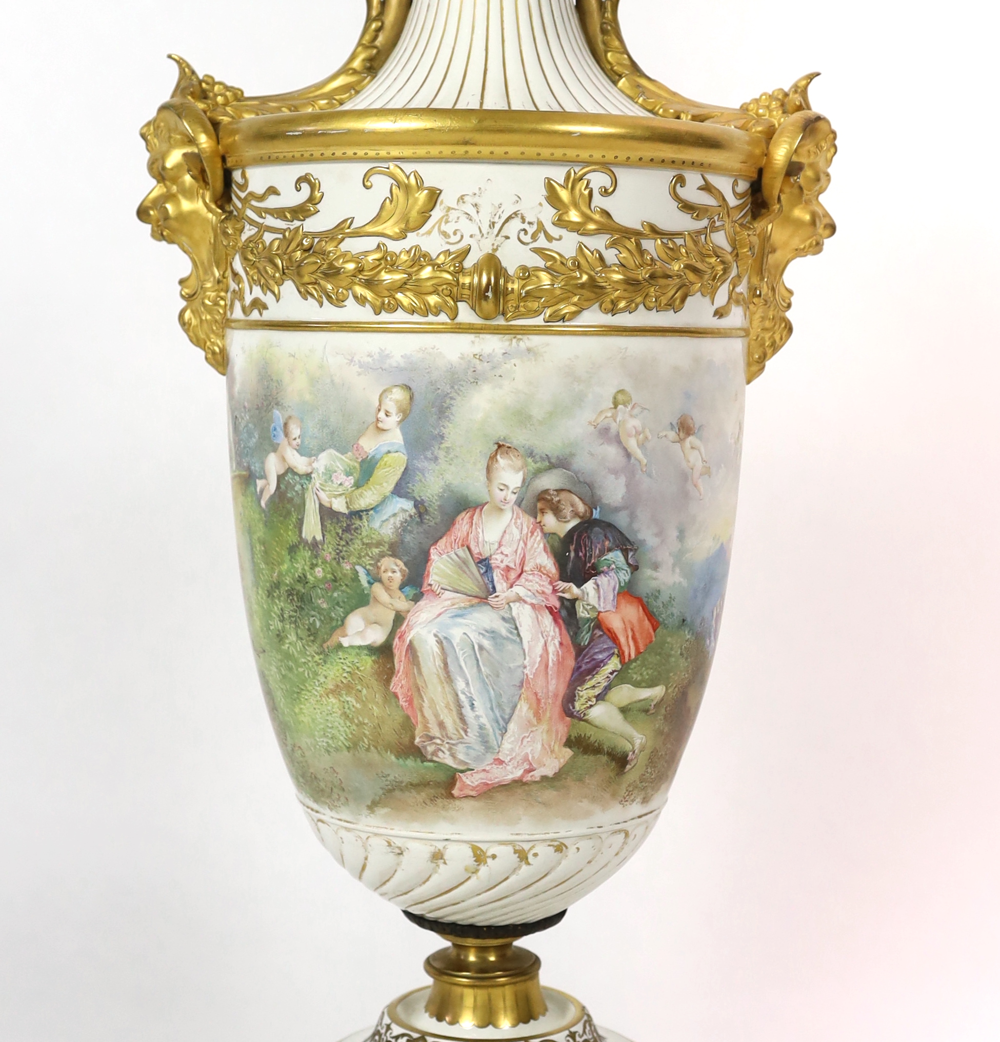 A large French porcelain and ormolu mounted vase, late 19th century, wear to gilding